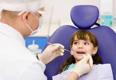 Little girl in dental chair